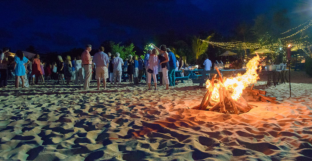 Beach bonfire glows in front of a private party outside Blanchards Beach Shack in Anguilla